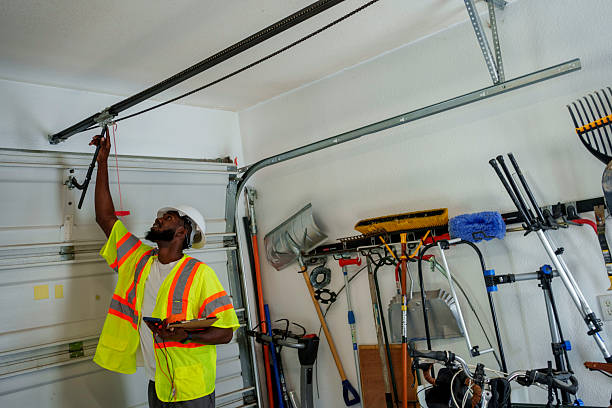 Professional Garage Door Panel Replacement technician working in Cherokee County County, NC